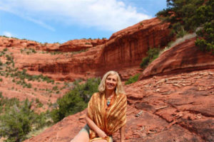 Katherine Lash preparing for a chakra ceremony on the red rocks
