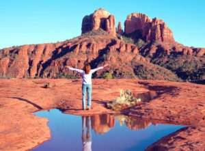 Woman standing before Catherdral Rock-Vacation in Sedona