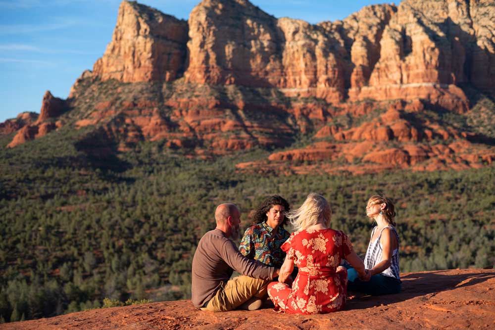 guests-on-red-rocks-with-katherine guests on sedona vortex adventure