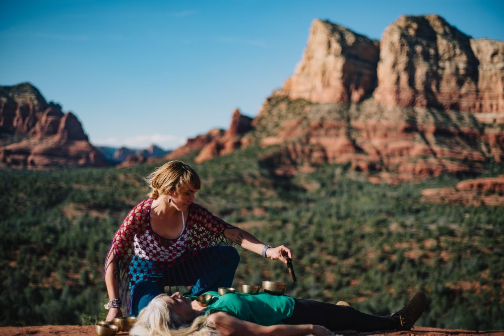 breathwork on red rocks during a sedona vortex adventure