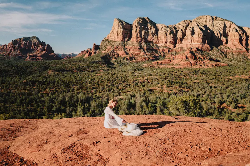 girl plays bowl on sedona red rocks for sedona vortex adventure